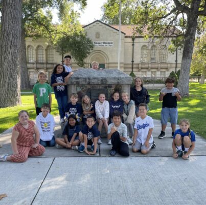 Class photo of children at the Pioneer Museum