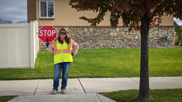 Crossing guard with stop sign.