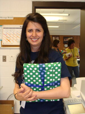 Teacher holding gift
