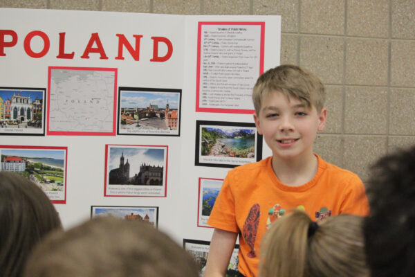 Display about Poland with young man.