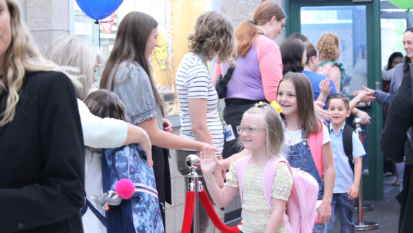 Children greeting teachers.