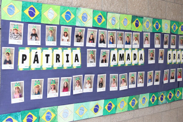 Individual student pictures all together on a large poster.