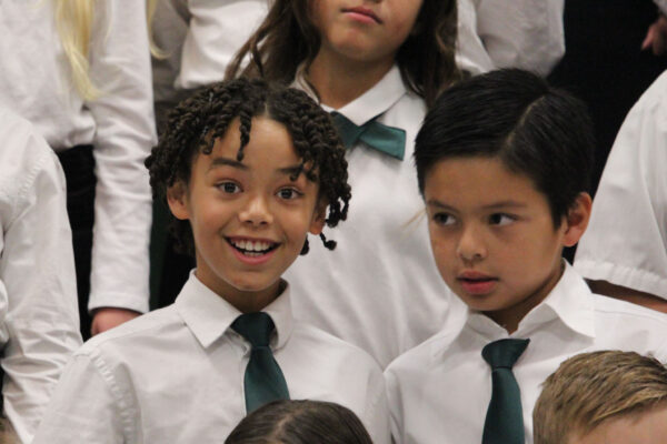 Two young men prepare for their concert.