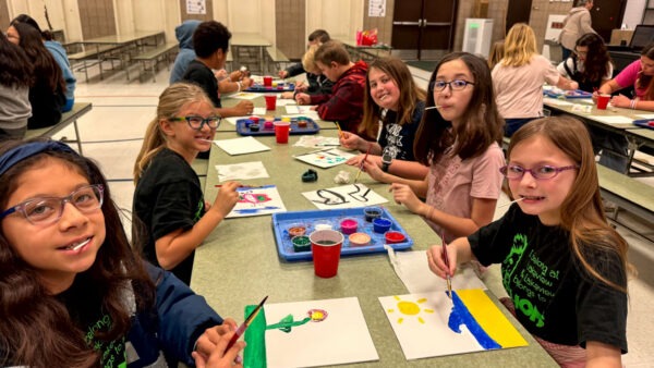 Students painting.