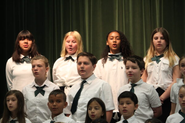 Choir singing.