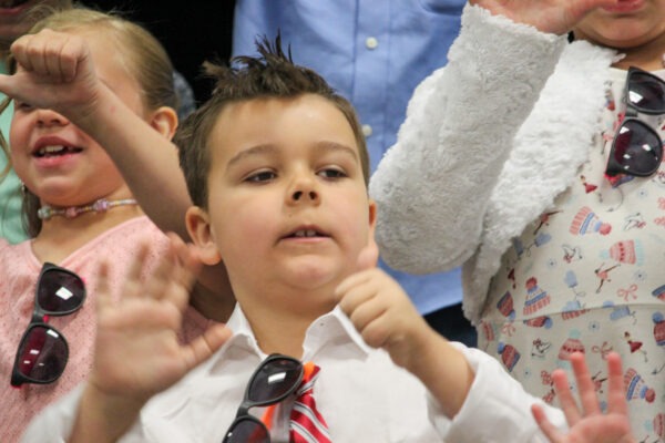 Young boy performing.