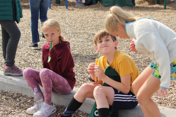 Children enjoying Otter Pops.