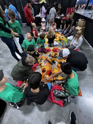 students play with construction toys