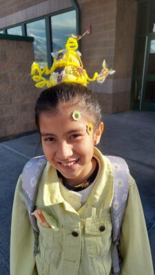 Girl student with fun hat